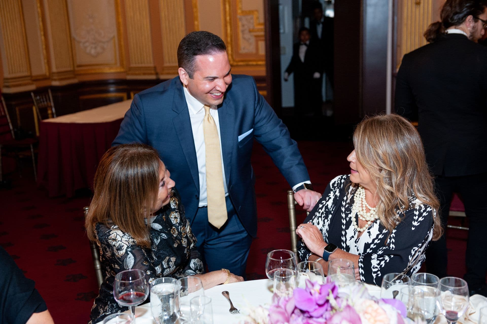 Vincent Socci engaging with real estate agents at a company event